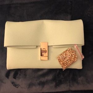 Mint green convertible clutch